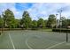 Outdoor basketball court with multiple hoops, perfect for friendly games and staying active at 3875 Darston St, Palm Harbor, FL 34685