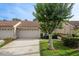 Charming home featuring a tiled roof, attached garage, and well-manicured lawn at 3875 Darston St, Palm Harbor, FL 34685