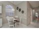 Cozy kitchen nook with a view, ideal for casual dining and enjoying natural light at 3875 Darston St, Palm Harbor, FL 34685