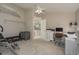 Home office featuring neutral carpet and a practical workstation setup with office furniture at 3875 Darston St, Palm Harbor, FL 34685