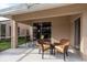Enjoy this screened patio with comfortable seating and a peaceful view of the community at 3875 Darston St, Palm Harbor, FL 34685