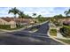 Street view of the Salem Village community entrance lined with palm trees at 3875 Darston St, Palm Harbor, FL 34685