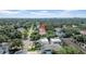 Scenic aerial view of a neighborhood, showcasing lush greenery and a mix of residential architecture at 3903 W De Leon St, Tampa, FL 33609