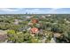 Beautiful aerial view of homes surrounded by lush trees, offering a serene neighborhood setting at 3903 W De Leon St, Tampa, FL 33609