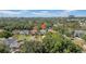 Areal view of a neighborhood with lush trees and landscaped properties at 3903 W De Leon St, Tampa, FL 33609