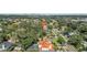 Overhead shot of a tree-filled neighborhood showcasing a mix of homes and quiet, picturesque streets at 3903 W De Leon St, Tampa, FL 33609