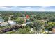 Scenic aerial view of a quiet neighborhood with mature trees and well-maintained properties at 3903 W De Leon St, Tampa, FL 33609