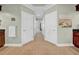 Bathroom hallway with closet doors on either side leading into the bedroom at 3903 W De Leon St, Tampa, FL 33609