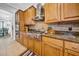 Gourmet kitchen with stainless steel range, custom cabinets, and granite countertops at 3903 W De Leon St, Tampa, FL 33609