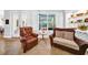 Inviting living room featuring comfortable seating and natural light, perfect for relaxation and conversation at 3903 W De Leon St, Tampa, FL 33609