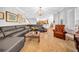 Spacious living room with tile floors, comfortable seating, and a view of the kitchen at 3903 W De Leon St, Tampa, FL 33609