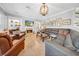 Elegant living room with modern furnishings, a fireplace, and stylish decor at 3903 W De Leon St, Tampa, FL 33609