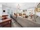 Inviting living room with a fireplace, built-in shelving, and a comfortable seating area at 3903 W De Leon St, Tampa, FL 33609