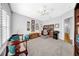 Bright office space featuring neutral paint, plantation shutters, and space for furniture at 3903 W De Leon St, Tampa, FL 33609