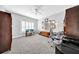 Spacious home office with a large window and plenty of room for a desk and storage at 3903 W De Leon St, Tampa, FL 33609