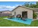 Backyard patio with outdoor seating and grill, perfect for enjoying warm days outside at 4021 Vana Dr, Sarasota, FL 34241