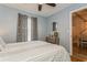 Serene bedroom featuring neutral decor, ceiling fan, and comfortable queen-size bed at 4021 Vana Dr, Sarasota, FL 34241