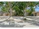 Charming single-story home with gravel yard and mature landscaping at 4021 Vana Dr, Sarasota, FL 34241