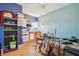 Combined living area with kitchen appliances, storage, and space for musical instruments at 4412 Bray Rd, Tampa, FL 33634