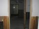 A view into the room showing the partially-framed walls at 4673 Dewey Dr, New Port Richey, FL 34652