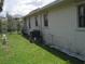 Property exterior featuring a green lawn, providing a peaceful outdoor space at 4673 Dewey Dr, New Port Richey, FL 34652