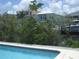 Stunning waterfront view with access to docks, set against the backdrop of lovely homes at 4673 Dewey Dr, New Port Richey, FL 34652