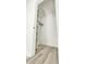 Walk-in closet features built in shelving and wood-look laminate flooring at 501 E Bay Dr # 3504, Largo, FL 33770