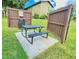 Inviting outdoor grill area with a picnic table and benches, creating a perfect spot for casual outdoor dining at 501 E Bay Dr # 3504, Largo, FL 33770