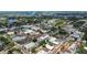 An aerial view showcasing a property's location within a vibrant downtown area near the water at 502 Lincoln Ave, Tarpon Springs, FL 34689
