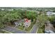 Aerial view of the property showcasing its location among lush greenery and neighborhood streets at 502 Lincoln Ave, Tarpon Springs, FL 34689