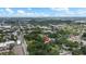 A scenic aerial shot highlights this property's location among tree-lined streets at 502 Lincoln Ave, Tarpon Springs, FL 34689