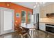 Eat-in kitchen area with stainless steel appliances and a cozy dining space at 502 Lincoln Ave, Tarpon Springs, FL 34689