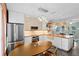 Well-equipped kitchen with modern appliances and stylish lighting at 502 Lincoln Ave, Tarpon Springs, FL 34689