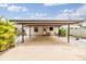 View of the covered backyard patio with landscaping at 507 4Th Sw Ave, Largo, FL 33770
