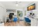 Bright home office with dual desks, stylish decor and outdoor views at 5102 White Pine Ne Cir, St Petersburg, FL 33703