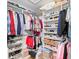 Spacious walk-in closet with built-in shelving and ample storage space at 5102 White Pine Ne Cir, St Petersburg, FL 33703