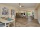 Spacious open-concept living and dining area with modern decor and lots of natural light at 5270 Miller Bayou Dr, Port Richey, FL 34668