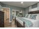 Primary bedroom with a ceiling fan, large closet, and a calming color palette at 5270 Miller Bayou Dr, Port Richey, FL 34668