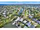Expansive aerial view showcases the serene waterfront community with convenient access to canals and nearby waters at 5331 Bayou Grande Ne Blvd, St Petersburg, FL 33703