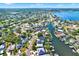 Scenic aerial view showcasing the beautiful waterfront homes, canals, and lush greenery of the neighborhood at 5331 Bayou Grande Ne Blvd, St Petersburg, FL 33703