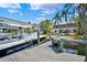 Home with a private dock and boat lift for easy access to water activities and enjoying waterfront lifestyle at 5331 Bayou Grande Ne Blvd, St Petersburg, FL 33703