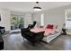 Main bedroom featuring balcony access and stylish furnishings at 5331 Bayou Grande Ne Blvd, St Petersburg, FL 33703