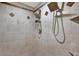 Contemporary shower featuring dual shower heads and tile accents at 5331 Bayou Grande Ne Blvd, St Petersburg, FL 33703