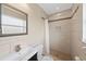 Bathroom with tiles, shower, toilet, and mirror at 5961 41St N Ave, St Petersburg, FL 33709