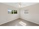 Bedroom with windows and ceiling fan at 5961 41St N Ave, St Petersburg, FL 33709
