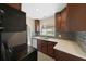 Well-lit kitchen with stainless steel appliances, and shaker cabinets with stylish hardware at 5961 41St N Ave, St Petersburg, FL 33709