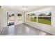 Bright living room with polished concrete floors and lots of natural light at 5961 41St N Ave, St Petersburg, FL 33709