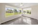 Bright living room with polished concrete floors and lots of natural light at 5961 41St N Ave, St Petersburg, FL 33709