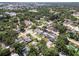 Scenic aerial view of the neighborhood with tree-lined streets and well-kept homes at 6006 114Th N Ter, Pinellas Park, FL 33782