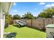 Large, fenced backyard with lush green lawn and ample space for outdoor activities at 6006 114Th N Ter, Pinellas Park, FL 33782